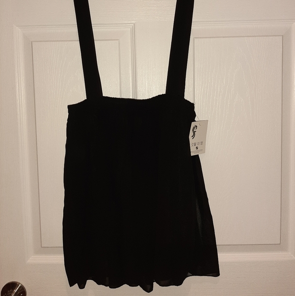Dresses & Skirts - Black skirt with attached suspender feature size S Dresses & Skirts - Black skirt with attached suspender feature size S
